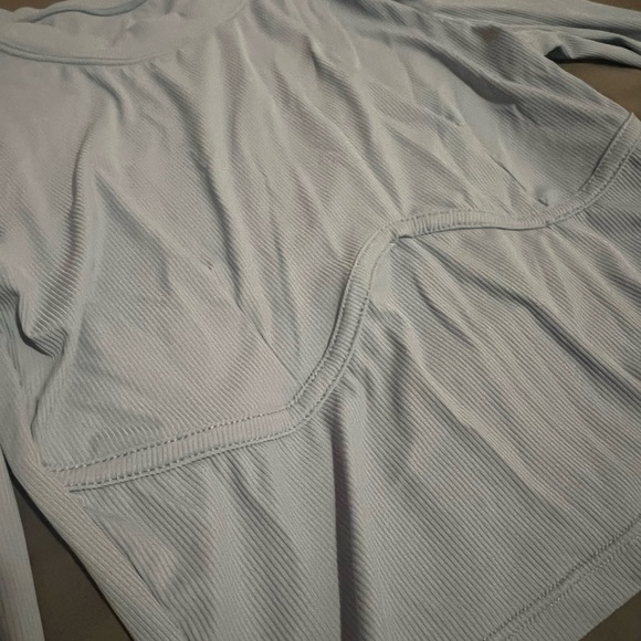 Light blue long sleeve. Says medium size 6 but fits xs/small. Never worn - Picture 2 of 2